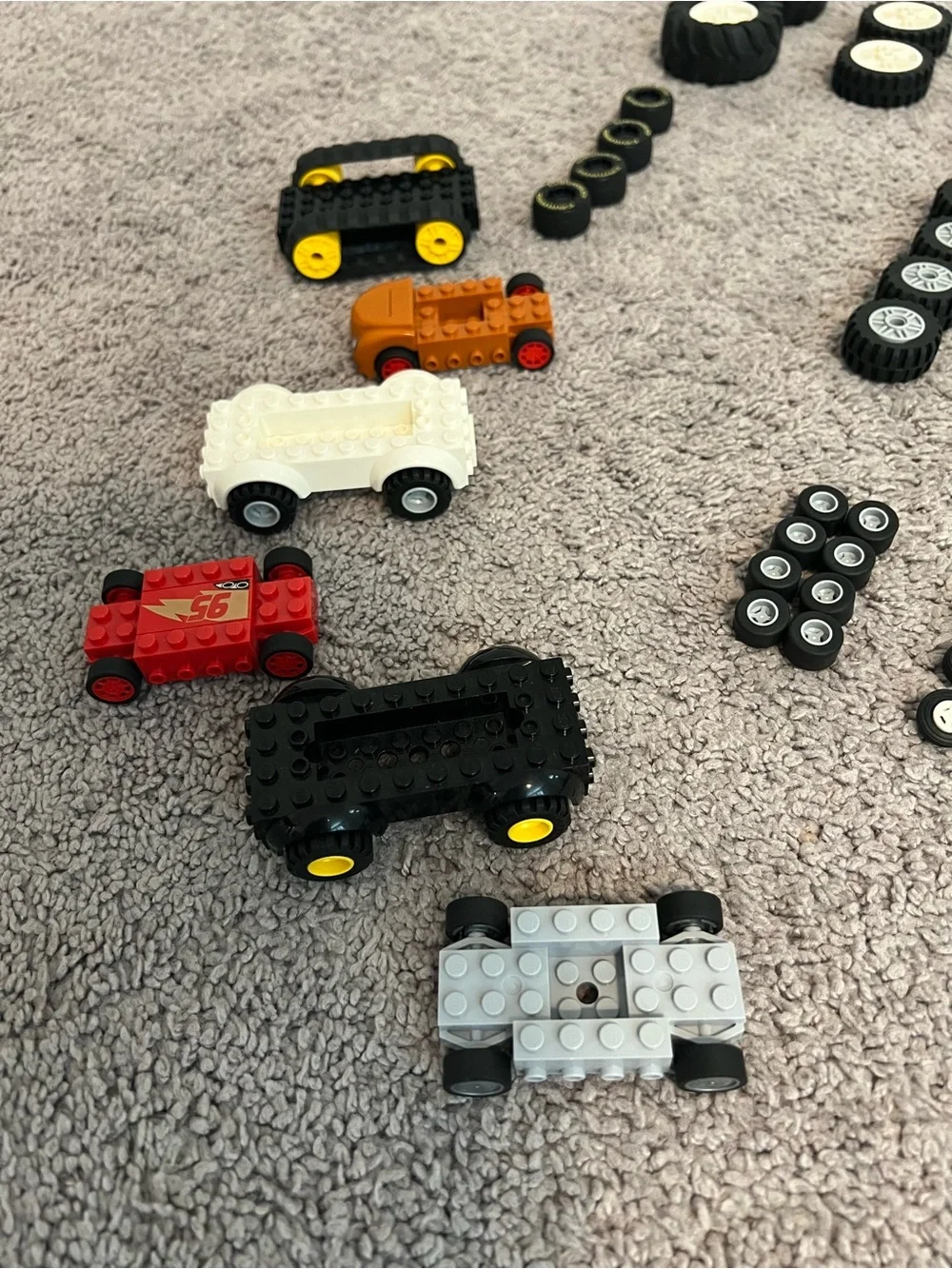 LEGO-Assorted Black and White Wheels and Car Pieces